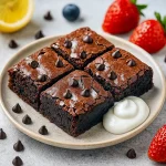 A pan of fudgy, chocolatey Yogurt Brownies Recipe made with Greek yogurt, showcasing a healthier spin on classic brownies. Perfect for Healthy Box Brownies lovers or anyone craving Healthy Macro Friendly Desserts.