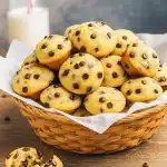 Mini chocolate chip muffins on a cooling rack, baked golden and fluffy—perfect Healthy Breakfast Mini Muffins, Get Together Snack Ideas, and Kids Birthday Snacks For School, made with wholesome ingredients for Clean Recipes For Kids.