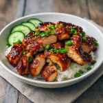 Sticky Gochujang Chicken coated in a glossy honey glaze, perfect for Asian Chicken Recipes and Chicken Dishes, inspired by Petite Cuisine style, ideal for Asian Cooking and Asian Dishes, a must-try Asian Recipes dish for foodies who I Love Food, served hot, Bon Appétit!